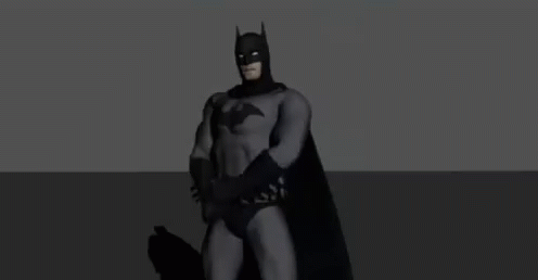 a black and white image of a man dressed like a batman