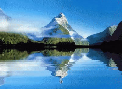 a view of a mountain with a reflection on it
