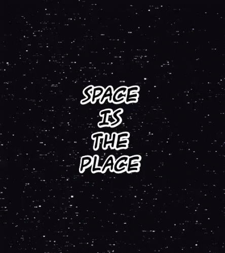 a space is the place sign painted on to a black wall