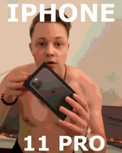 an image of a guy showing off his cell phone