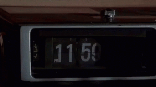 a close up of a digital clock on the top of a truck
