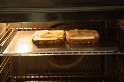 the food is being prepared in the oven