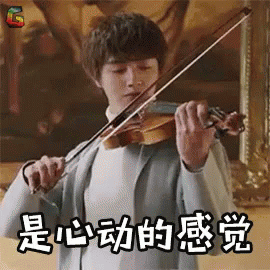 a girl wearing an orange top is playing violin in the song'moonlight kiss '