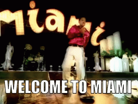 an advertit for miami, featuring a man on stage