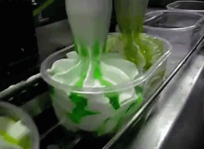 there is a machine that is producing a drink