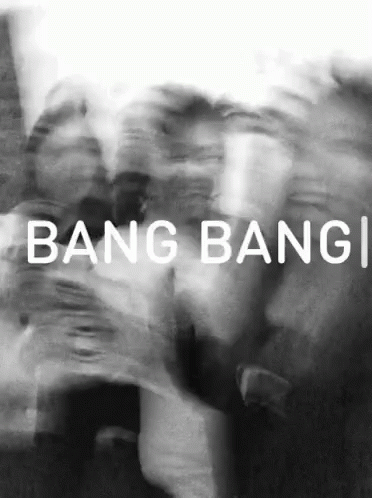 a blurry po of a man and woman with the words bang bang