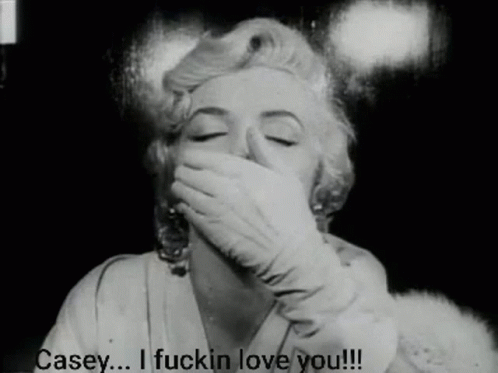 marilyn monroe blowing her nose as she looks sad