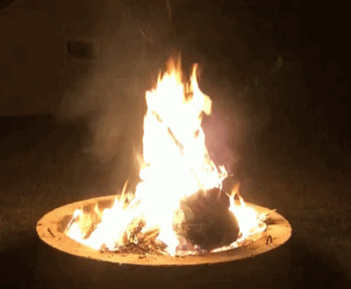 a white fire in a lit up bowl
