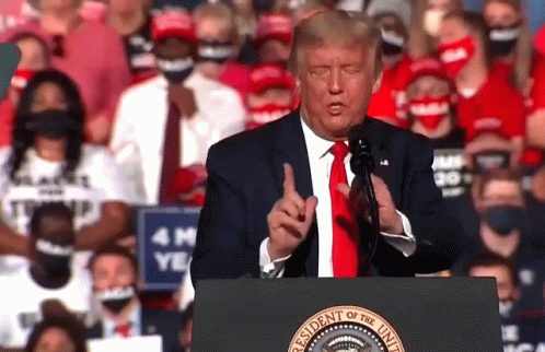 the president gives a speech in front of a crowd