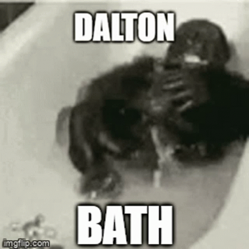 a black and white po of a bath tub that says, dalton bath