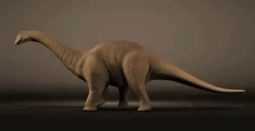 a fake dinosaur with a grey background