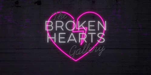 the words, broken hearts galaxy are on a black wall