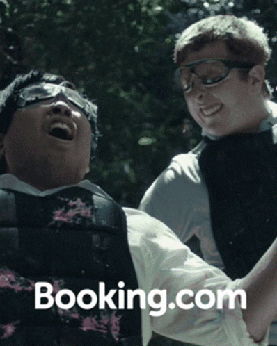 an advertit for booking com featuring three men in vests