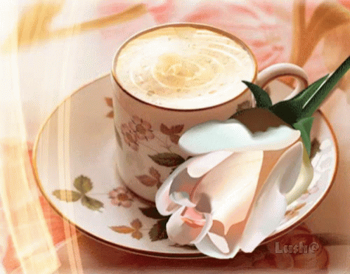 tea cup with flowers on saucer with erfly napkins