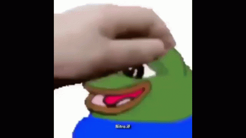 a blurry picture of an animated frog pointing his finger toward the camera