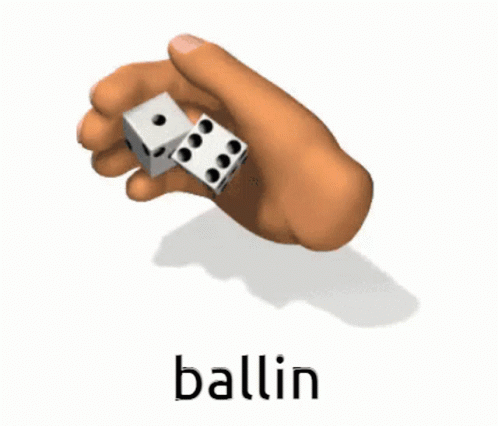 a pair of dices that are sitting on the word ballin