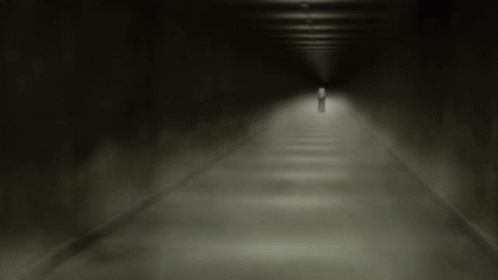 a ghostly image of a man standing alone