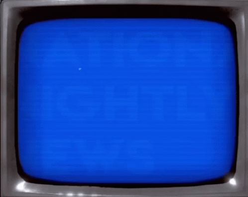an old tv screen with the orange and black finish