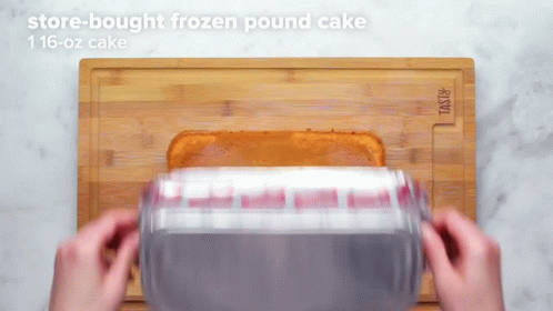 someone is using a frozen treat machine to make cake