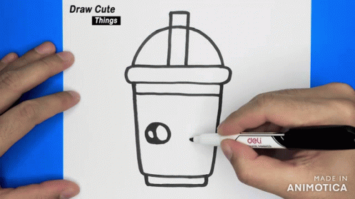 the hands of a young man are drawing the image of a coffee cup