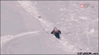 the person is skiing down the mountain alone