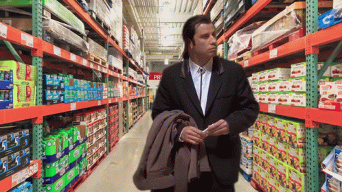 a man with dark blue eyes in a large supermarket