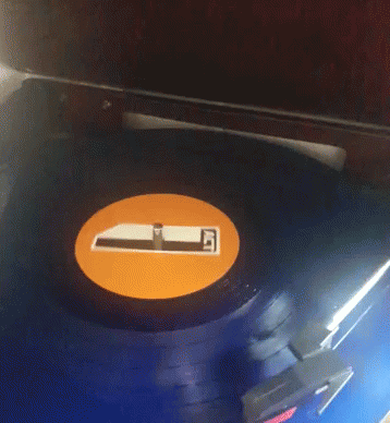 an image of an old vinyl player with a record