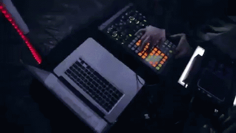 a person is typing on a lap top with keyboards