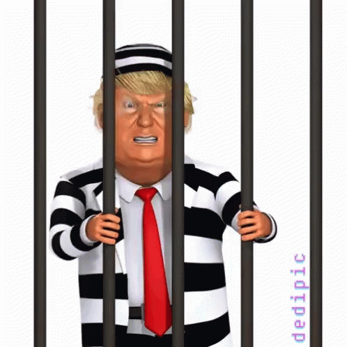 a blue cartoon is in , with his hands in  bars