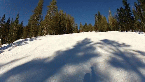 a person is skiing down a very steep hill
