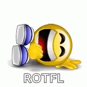 a blue and red ball and white ball are sitting on top of the word rotfl