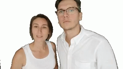 the man and woman are dressed in white shirts
