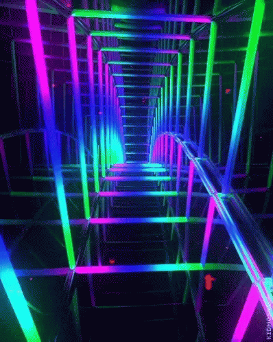 a row of neon colored metal pipes
