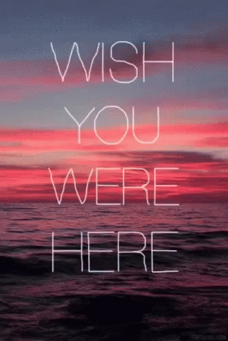the words wish you were here against a dark blue background