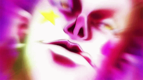 colorful abstract pograph of the face of a woman