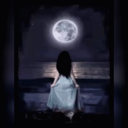 a girl is looking out at the moon with her back to the camera