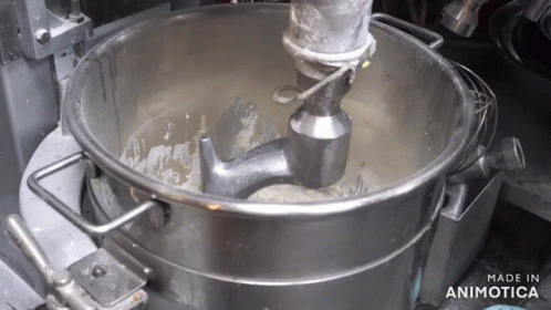 a metal bucket that is filled with water