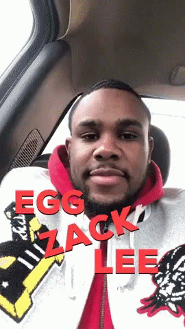 a black man with an egg jack lee tie in his hoodie