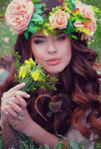 a beautiful young woman with flowers in her hair