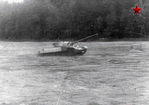a tank floating in a body of water with a blue star