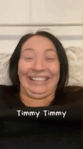 a woman has an animated purple face with the words jimmy timmy on it