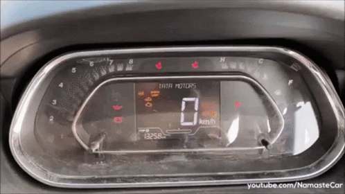 an old digital meter sits empty in a car