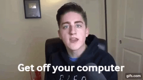 a young man with white makeup has the text get off your computer