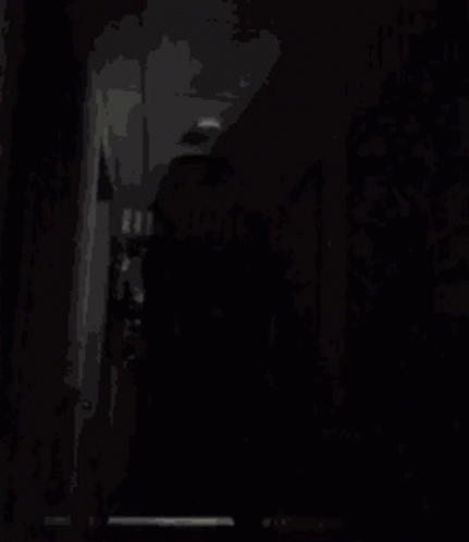 the ghostly figure is seen in the dark