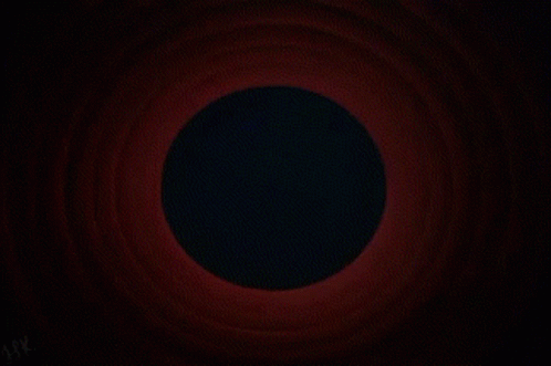 a dark blue circle has a hole in the middle