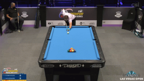 an action - packed billiard game is shown in progress