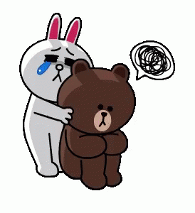 two small bears hugging each other with a balloon