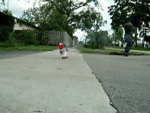 a  on skateboard performing tricks in the street