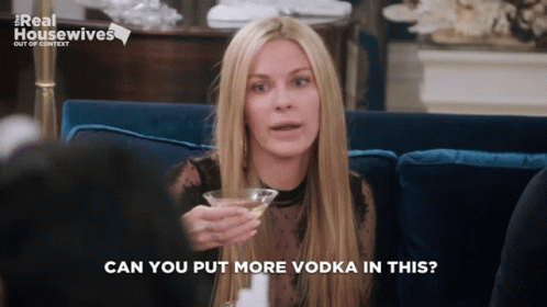 a girl is having a vodka ad with the caption can you put more vodka in this?