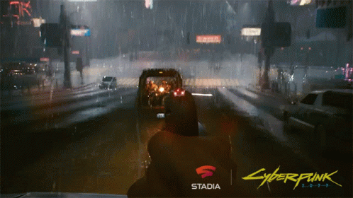 the screens shows a car driving through a city